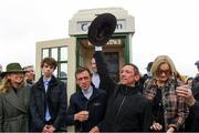 30 September 2021; Jockeys Frankie Dettori, with the hat of the late trainer Barney Curley, Shane Kelly, left, and Jamie Spencer, behind, in the famous phone box, associated with the Yellow Sam coup in 1975, before the Gannon City Recovery and Recycling Services Ltd supporting DAFA handicap at Bellewstown Racecourse in Collierstown, Meath. Photo by Matt Browne/Sportsfile