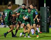 1 October 2021; Tiernan O’Halloran of Connacht is congratulated by team-mates John Porch, Tom Daly and Jack Carty of Connacht after scoring their side's first try Bulls during the United Rugby Championship match between Connacht and Vodacom Bulls at The Sportsground in Galway. Photo by Brendan Moran/Sportsfile