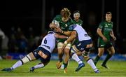 1 October 2021; Cian Prendergast of Connacht is tackled by Marcell Coetzee and Elrigh Louw of Vodacom Bulls during the United Rugby Championship match between Connacht and Vodacom Bulls at The Sportsground in Galway. Photo by Brendan Moran/Sportsfile