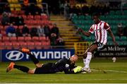 1 October 2021; Shamrock Rovers goalkeeper Alan Mannus contests a breaking ball with Junior Ogedi-Uzokwe of Derry City during the SSE Airtricity League Premier Division match between Shamrock Rovers and Derry City at Tallaght Stadium in Dublin. Photo by Eóin Noonan/Sportsfile