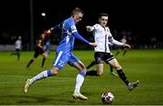 1 October 2021; Ryan Rainey of Finn Harps in action against Darragh Leahy of Dundalk during the SSE Airtricity League Premier Division match between Finn Harps and Dundalk at Finn Park in Ballybofey, Donegal. Photo by Ramsey Cardy/Sportsfile