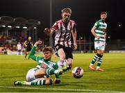 1 October 2021; Sean Gannon of Shamrock Rovers in action against Jamie McGonigle of Derry City during the SSE Airtricity League Premier Division match between Shamrock Rovers and Derry City at Tallaght Stadium in Dublin. Photo by Eóin Noonan/Sportsfile