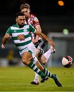 1 October 2021; Roberto Lopes of Shamrock Rovers in action against Jamie McGonigle of Derry City during the SSE Airtricity League Premier Division match between Shamrock Rovers and Derry City at Tallaght Stadium in Dublin. Photo by Eóin Noonan/Sportsfile