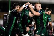 1 October 2021; Mack Hansen of Connacht celebrates after scoring his side's third try with team-mates Tiernan O'Halloran and Jordan Duggan during the United Rugby Championship match between Connacht and Vodacom Bulls at The Sportsground in Galway. Photo by Harry Murphy/Sportsfile