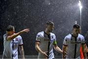 1 October 2021; Dundalk players, from left, Sean Murray, Andy Boyle and Patrick Hoban leave the pitch at half-time during the SSE Airtricity League Premier Division match between Finn Harps and Dundalk at Finn Park in Ballybofey, Donegal. Photo by Ramsey Cardy/Sportsfile