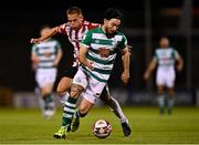 1 October 2021; Richie Towell of Shamrock Rovers in action against Jack Malone of Derry City during the SSE Airtricity League Premier Division match between Shamrock Rovers and Derry City at Tallaght Stadium in Dublin. Photo by Eóin Noonan/Sportsfile