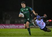 1 October 2021; Tom Farrell of Connacht evades the tackle of Lionel Mapoe of Vodacom Bulls on his way to scoring his side's fourth try during the United Rugby Championship match between Connacht and Vodacom Bulls at The Sportsground in Galway. Photo by Harry Murphy/Sportsfile