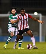 1 October 2021; James Akintunde of Derry City in action against Richie Towell of Shamrock Rovers during the SSE Airtricity League Premier Division match between Shamrock Rovers and Derry City at Tallaght Stadium in Dublin. Photo by Eóin Noonan/Sportsfile