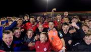 1 October 2021; Shelbourne players and supporters celebrate after the SSE Airtricity League First Division match between Shelbourne and Treaty United at Tolka Park in Dublin. Photo by Matt Browne/Sportsfile