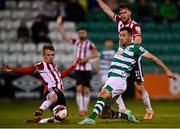 1 October 2021; Aaron Greene of Shamrock Rovers has a shot on goal blocked by Will Fitzgerald of Derry City  during the SSE Airtricity League Premier Division match between Shamrock Rovers and Derry City at Tallaght Stadium in Dublin. Photo by Eóin Noonan/Sportsfile