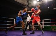 2 October 2021; Sean Donaghy of St Canices Boxing Club, Derry, right, and Gabriel Dossen of Olympic Boxing Club, Galway, during their 75kg bout at the IABA National Elite Boxing Championships Finals in the National Stadium in Dublin. Photo by Seb Daly/Sportsfile