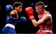 2 October 2021; Sean Donaghy of St Canices Boxing Club, Derry, right, and Gabriel Dossen of Olympic Boxing Club, Galway, during their 75kg bout at the IABA National Elite Boxing Championships Finals in the National Stadium in Dublin. Photo by Seb Daly/Sportsfile