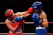 2 October 2021; Eve Woods of Corinthians Boxing Club, Dublin, left, and Gillian Duffy of St Mary's Boxing Club, Dublin, during their 63kg bout at the IABA National Elite Boxing Championships Finals in the National Stadium in Dublin. Photo by Seb Daly/Sportsfile