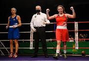 2 October 2021; Eve Woods of Corinthians Boxing Club, Dublin, right, celebrates her victory over Gillian Duffy of St Mary's Boxing Club, Dublin, after their 63kg bout at the IABA National Elite Boxing Championships Finals in the National Stadium in Dublin. Photo by Seb Daly/Sportsfile