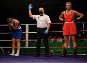 2 October 2021; Bethany Doocey of Castlebar Boxing Club, Mayo, left, celebrates after her victory over Nel Fox of Rathkeale Boxing Club, Limerick, during their 81kg bout at the IABA National Elite Boxing Championships Finals in the National Stadium in Dublin. Photo by Seb Daly/Sportsfile