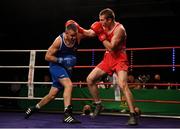 2 October 2021; Faolain Rahill of DCU Athletic Boxing Club, Dublin, and Darren O’Neill of Paulstown Boxing Club, Kilkenny, left, during their 86kg bout at the IABA National Elite Boxing Championships Finals in the National Stadium in Dublin. Photo by Seb Daly/Sportsfile