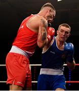 2 October 2021; Marcin Skalski of Athlone Boxing Club, Westmeath, left, and Jack Marley of Monkstown Boxing Club, Dublin, during their 92kg bout at the IABA National Elite Boxing Championships Finals in the National Stadium in Dublin. Photo by Seb Daly/Sportsfile
