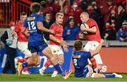 2 October 2021; Keith Earls of Munster is tackled by Evan Roos of DHL Stormers during the United Rugby Championship match between Munster and DHL Stormers at Thomond Park in Limerick. Photo by Brendan Moran/Sportsfile