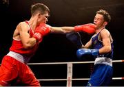 2 October 2021; Adam Hession of Monivea Boxing Club, Galway, left, and Sean Purcell of Saviours Crystal Boxing Club, Waterford, during their 57kg bout at the IABA National Elite Boxing Championships Finals in the National Stadium in Dublin. Photo by Seb Daly/Sportsfile