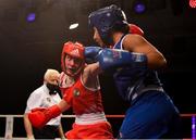 2 October 2021; Niamh Fay of Ballyboughal Boxing Club, Dublin, left, and Sara Haghighat-joo of St Brigid's Boxing Club, Edenderry, Offaly, during their 54kg bout at the IABA National Elite Boxing Championships Finals in the National Stadium in Dublin. Photo by Seb Daly/Sportsfile
