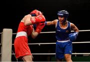 2 October 2021; Sara Haghighat-joo of St Brigid's Boxing Club, Edenderry, Offaly, right, and Niamh Fay of Ballyboughal Boxing Club, Dublin, during their 54kg bout at the IABA National Elite Boxing Championships Finals in the National Stadium in Dublin. Photo by Seb Daly/Sportsfile