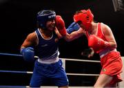 2 October 2021; Sara Haghighat-joo of St Brigid's Boxing Club, Edenderry, Offaly, left, and Niamh Fay of Ballyboughal Boxing Club, Dublin, during their 54kg bout at the IABA National Elite Boxing Championships Finals in the National Stadium in Dublin. Photo by Seb Daly/Sportsfile