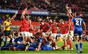 2 October 2021; Munster players celebrate after Jack O'Donoghue of Munster, hidden, goes over to score their fourth try during the United Rugby Championship match between Munster and DHL Stormers at Thomond Park in Limerick. Photo by Sam Barnes/Sportsfile