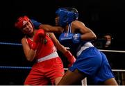 2 October 2021; Lisa O’Rourke of Castlerea Boxing Club, Roscommon, left, and Evelyn Igharo of Clann Naofa Boxing Club Dundalk, Louth, during their 70kg bout  at the IABA National Elite Boxing Championships Finals in the National Stadium in Dublin. Photo by Seb Daly/Sportsfile