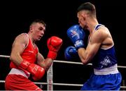 2 October 2021; Kieran Molloy of Oughterard Boxing Club, Galway, left, and Luke Maguire of Esker Boxing Club, Dublin, during their 71kg bout at the IABA National Elite Boxing Championships Finals in the National Stadium in Dublin. Photo by Seb Daly/Sportsfile