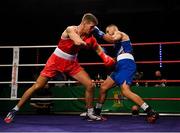 2 October 2021; Kelyn Cassidy of Saviours Crystal Boxing Club, Waterford, right, and Tommy Hyde of St Michael's Boxing Club, Athy, Kildare, during their 80kg bout at the IABA National Elite Boxing Championships Finals in the National Stadium in Dublin. Photo by Seb Daly/Sportsfile
