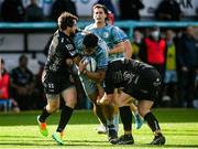 3 October 2021; Michael Ala'alatoa of Leinster is tackled by Rhodri Williams and Greg Bateman of Dragons during the United Rugby Championship match between Dragons and Leinster at Rodney Parade in Newport, Wales. Photo by Harry Murphy/Sportsfile