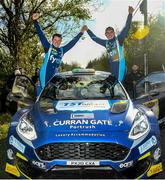 3 October 2021; Callum Devine and co-driver Brian Hoy, in a Ford Fiesta Rally 2, celebrate their victory after stage 6 of the Donegal Harvest Stages Rally in Donegal. Photo by Philip Fitzpatrick/Sportsfile