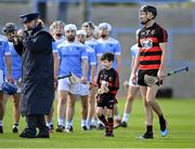 3 October 2021; Ballygunner captain Barry Coughlan with his son Con in the parade before the Waterford County Senior Club Hurling Championship Final match between Roanmore and Ballygunner at Walsh Park in Waterford. Photo by Piaras Ó Mídheach/Sportsfile