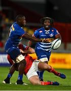 2 October 2021; Nama Xaba of DHL Stormers offloads the ball as he is tackled by Niall Scannell of Munster during the United Rugby Championship match between Munster and DHL Stormers at Thomond Park in Limerick. Photo by Sam Barnes/Sportsfile