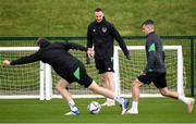 4 October 2021; Will Keane, centre, with Nathan Collins, left, and Jason Knight, right, during a Republic of Ireland training session at the FAI National Training Centre in Abbotstown in Dublin. Photo by Stephen McCarthy/Sportsfile
