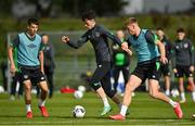 4 October 2021; Alex Gilbert, centre, with Mark McGuinness, right, and Conor Noss during a Republic of Ireland U21 training session at the FAI National Training Centre in Abbotstown in Dublin. Photo by Seb Daly/Sportsfile