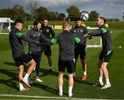 4 October 2021; Players, from left, Jamie McGrath, Harry Arter, coach Damien Doyle, Daryl Horgan, John Egan and Will Keane during a Republic of Ireland training session at the FAI National Training Centre in Abbotstown in Dublin. Photo by Stephen McCarthy/Sportsfile