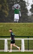 4 October 2021; Republic of Ireland's Euro 88 mascot Macúl welcomes Will Keane during a Republic of Ireland training session at the FAI National Training Centre in Abbotstown in Dublin. Photo by Stephen McCarthy/Sportsfile