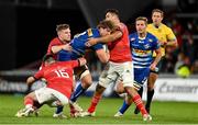 2 October 2021; Evan Roos of DHL Stormers is tackled by Munster players, from left, Diarmuid Barron, Rory Scannell and Jack O'Sullivan during the United Rugby Championship match between Munster and DHL Stormers at Thomond Park in Limerick. Photo by Brendan Moran/Sportsfile