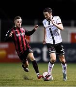 27 September 2021; Michael Duffy of Dundalk and Liam Burt of Bohemians during the SSE Airtricity League Premier Division match between Dundalk and Bohemians at Oriel Park in Dundalk, Louth. Photo by Ben McShane/Sportsfile