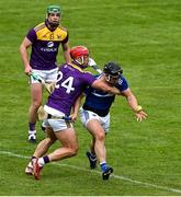 9 May 2021; Lee Cleere of Laois in action against Lee Chin of Wexford during the Allianz Hurling League Division 1 Group B Round 1 match between Wexford and Laois at Chadwicks Wexford Park in Wexford. Photo by Brendan Moran/Sportsfile