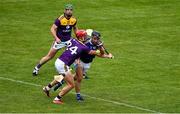 9 May 2021; Lee Cleere of Laois in action against Lee Chin of Wexford during the Allianz Hurling League Division 1 Group B Round 1 match between Wexford and Laois at Chadwicks Wexford Park in Wexford. Photo by Brendan Moran/Sportsfile