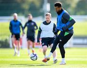 5 October 2021; Cyrus Christie and Daryl Horgan, left, during a Republic of Ireland training session at the FAI National Training Centre in Abbotstown in Dublin. Photo by Stephen McCarthy/Sportsfile