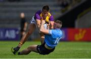 4 July 2021; Eoin Porter of Wexford and Paddy Small of Dublin tussle during the Leinster GAA Football Senior Championship Quarter-Final match between Wexford and Dublin at Chadwicks Wexford Park in Wexford. Photo by Brendan Moran/Sportsfile