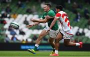 3 July 2021; Jacob Stockdale of Ireland in action against Timothy Lafaele of Japan during the International Rugby Friendly match between Ireland and Japan at Aviva Stadium in Dublin. Photo by Brendan Moran/Sportsfile