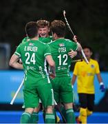 5 October 2021; Sam Hyland of Ireland, centre, celebrates after scoring his side's first goal during an international friendly match between Ireland and Malaysia at Lisnagarvey Hockey Club in Hillsborough, Down. Photo by Ramsey Cardy/Sportsfile