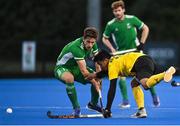 5 October 2021; Faizal Saari of Malaysia in action against Kevin O'Dea of Ireland during an international friendly match between Ireland and Malaysia at Lisnagarvey Hockey Club in Hillsborough, Down. Photo by Ramsey Cardy/Sportsfile