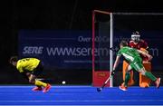 5 October 2021; Abu Kamal Azrai of Malaysia shoots to score his side's first goal during an international friendly match between Ireland and Malaysia at Lisnagarvey Hockey Club in Hillsborough, Down. Photo by Ramsey Cardy/Sportsfile