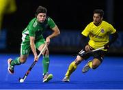 5 October 2021; Daragh Walsh of Ireland in action against Shahril Saabah of Malaysia during an international friendly match between Ireland and Malaysia at Lisnagarvey Hockey Club in Hillsborough, Down. Photo by Ramsey Cardy/Sportsfile