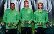 6 October 2021; Goalkeepers, from left, Gavin Bazunu, Mark Travers and Caoimhin Kelleher with their 2020-2021 Republic of Ireland international caps during a presentation at their team hotel in Dublin. Photo by Stephen McCarthy/Sportsfile